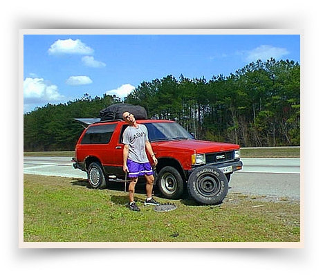 Daniel St.Pierre changing tire, South Carolina, Spring 2002